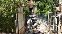 Kepez’de çöp apartman operasyonu: 20 kamyon çöp tahliye edildi